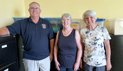 Kincardine Community Singers use Kincardine Lions donation for new filing cabinets