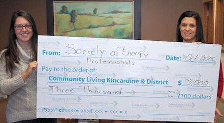 Society of Energy Professionals presents donations to Community Living, and Tiverton Fall Fair