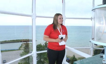 Crowd gathers for re-opening of Point Clark Lighthouse